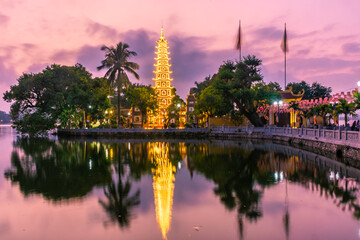 HANOI, VIETNAM, 4 JANUARY 2020: Beautiful sunset over the Tran Quoc Pagoda of Hanoi