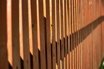 A wooden fence. Close-up fence.