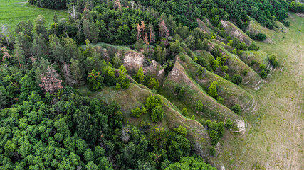 Fototapeta na wymiar Aerial view of mountain range and grass in the mountains