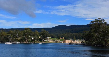 Fototapeta na wymiar he military district and ruins of the penitentiary as seen from the ferry out to isle of the dead and point puer, at port arthur historic site, port arthur, tasmania, australia