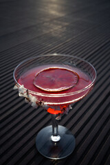 hemingway daiquiri cocktail drink with grapefruit in glass on wooden background