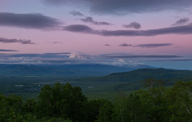 Fototapeta na wymiar Kamchatka, volcanoes Koryaksky and Avachinsky at sunset