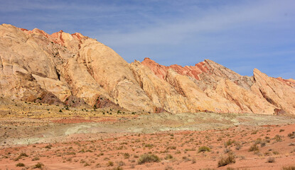 the  colorful flatiron rock formations in the san rafael reef near uneva canyon on a sunny day, near green river, utah