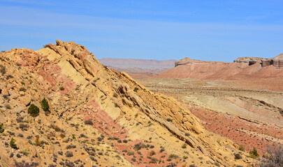 Fototapeta na wymiar looking out across the flatirons of the san rafael swell to the desolate, remote shadscale mesa from the trail up to uneva canyon, near green river, utah