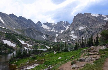 spectacular navajo, arapahoe, and shoshone peaks  and the trail along  isabelle lake in summer  in the indian peaks wilderness area, near nederland, colorado