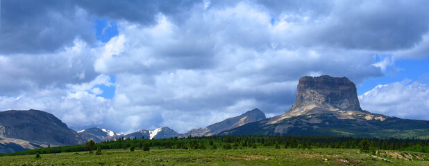 spectacular flat-topped  chief mountain in glacier national park in summer, as seen from  route 89 ...