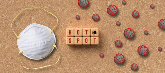 Virus Hot Spot concept for the Covid-19 pandemic on cork background