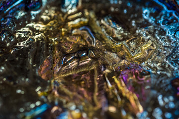 玉虫色をした金属の酸化被膜 - obrazy, fototapety, plakaty