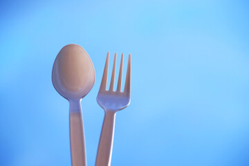 Close up of plastic fork and spoon