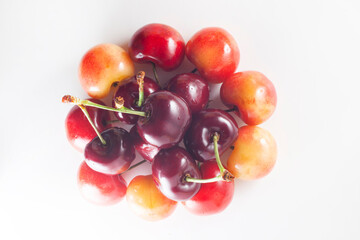 Rainier cherries in white background