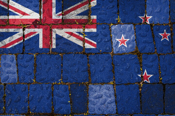 National flag of New Zealand on stone  wall background. Flag  banner on  stone texture background.