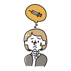 ワクチン接種について悩む女性