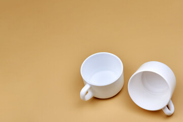 Fototapeta na wymiar Two clean empty coffee or tea cups.