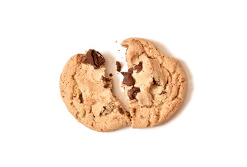 Broken chocolate chip cookie on a white background, overhead view