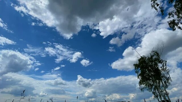 time-lapse parachutists in the sky