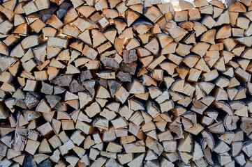 background of stacked firewood, woodpile