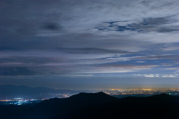  Chiang Mai city lights, sky, clouds, rain Distant view from the top of Night landscape, Chiang Mai city lights, sky, clouds, rain Distant view from the top of a mountain in Thailand Background image 