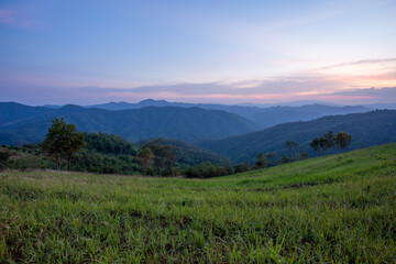 Sunset mountain scenery, green fields, agricultural areas that Thailand. Beautiful mountain views and space for text above.