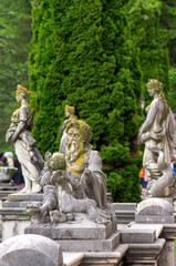 Fototapeta na wymiar Garden statuary - classical characters from antiquity