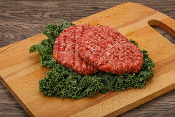 Raw beef burger cutlet for cooking