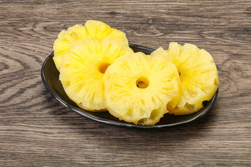 Sweet pineapple rings in the bowl
