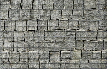 gabion made of stones and metal mesh, texture