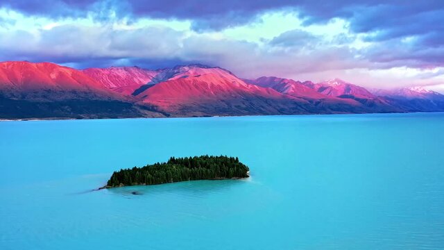 Aerial view of Lake Pukaki and Morgans Island in New Zealand, sunset landscape