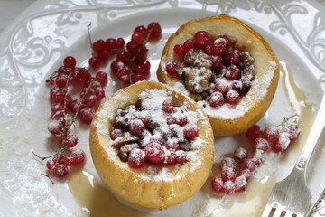 aked apples stuffed with berries in powdered sugar