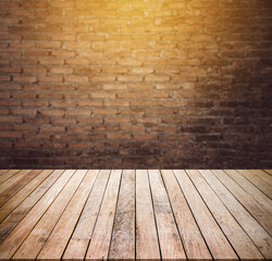 Old wood table with abstract old brick wall with light background for product display