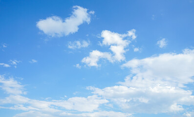 Blue sky with clouds and Sun can be use as background 