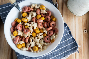 Colored cereals in a white bowl