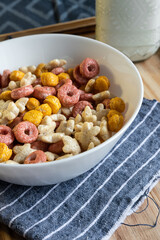 Colored cereals in a white bowl