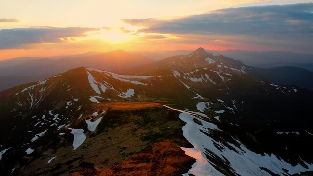 Cinematic aerial view of Carpathian mountains June. Chornohora and Hoverla - peak of highest mountain of Ukraine