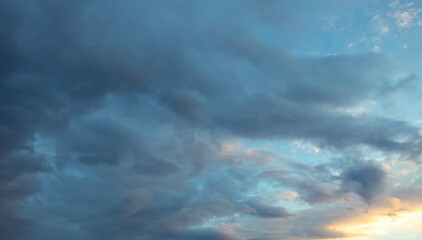 Fototapeta na wymiar Rain clouds in the sky at sunset