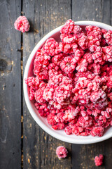 raspberries frozen berry long-term storage preparation for the winter on the table, healthy food meal snack copy space food background rustic. top view keto or paleo diet veggie vegan or vegetarian 