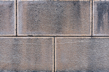 染みのある古いブロックの壁