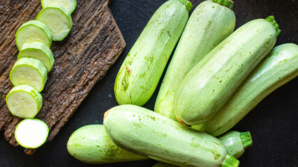 zucchini fresh vegetables Cooking harvest organic farm products on the table, healthy food meal copy space food background rustic. top view keto or paleo diet veggie vegan or vegetarian