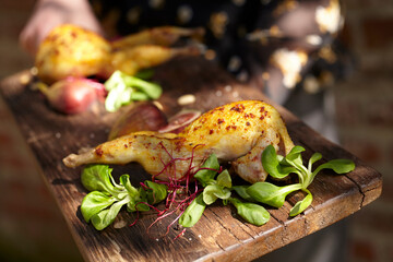 Appetizing grilled quail with herbs - obrazy, fototapety, plakaty