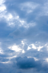 Naklejka na ściany i meble Dark blue cloudy sky before the rain vertical view