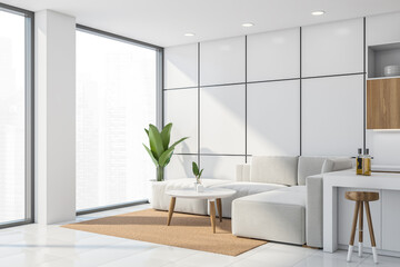 Corner of panoramic kitchen with sofa, white