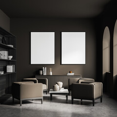 Two posters in the dark brown waiting room