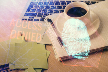 Double exposure of fingerprint drawing and desktop with coffee and items on table background. Concept of security.
