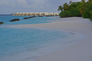 the sandy coast of a coral island in the Indian Ocean