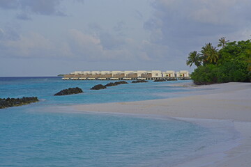 the sandy coast of a coral island in the Indian Ocean