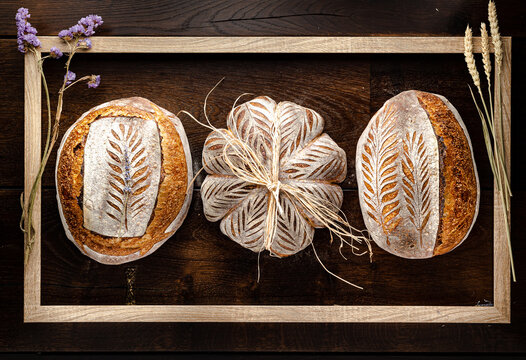 Sourdough bread in wooden frame