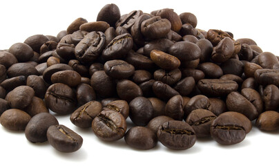 A bunch of coffee beans. Fried arabica isolated on white background.