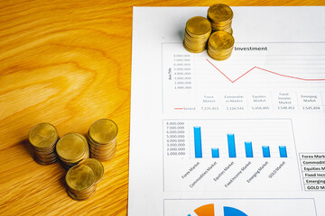 Personal financial planning concept. Businessman workplace with papers for financial planning. Business people discussing the charts and graphs showing the results of successful financial planning.	
