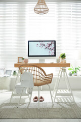 Stylish home office interior with comfortable workplace