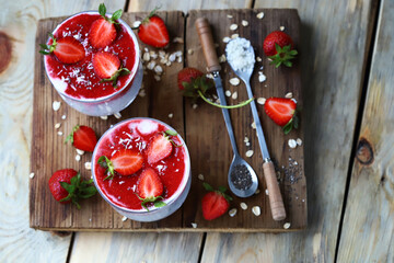 Chia coconut yogurt with strawberries. Delicious and healthy summer dessert. The keto diet.