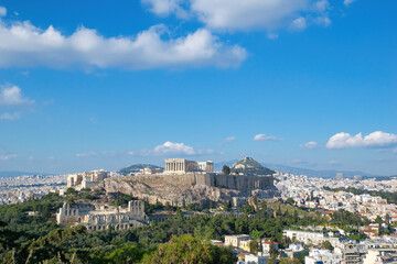 Fototapeta na wymiar Acropolis, Parthenon, Athens, Greece, summer 2021, as seen from the hill of Philopapos